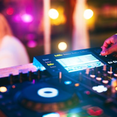 Dj,Playing,Music,During,Winter,Holiday,Party,Inside,Cocktail,Bar