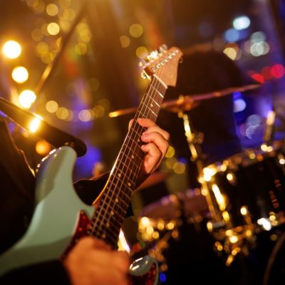 A,Guitarist,Plays,A,Chord,On,An,Electric,Guitar,During