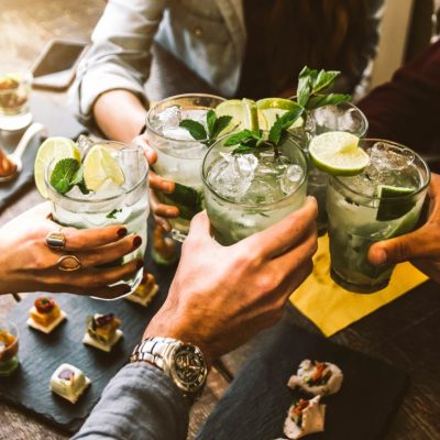 Happy,Friends,Group,Cheering,Mojito,Drinks,At,Cocktail,Bar,Restaurant