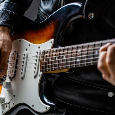 Close,Up,Hand,Playing,Electric,Guitar.,Musician,Playing,Guitar,,Live